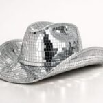 Disco cowboy hat with mirror tiles being carefully maintained to prevent falling off