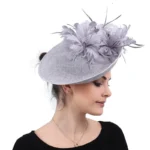 Elegant feather fascinator hat for derby and wedding events